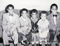 Children Sitting on Sofa - Art Print