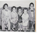 Children Sitting on Sofa - Wood Print